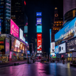 Times Square New York at night with bright digital billboards and an empty pedestrian plaza
